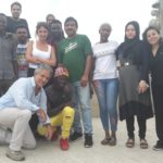 Coumba insieme agli altri cuochi del progetto “In Cammino, Catering Migrante”