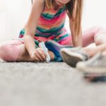 little-girl-drawing-with-chalk-on-ground